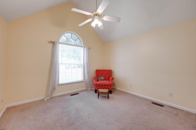 unfurnished room with vaulted ceiling, ceiling fan, and light colored carpet