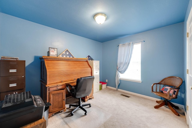 view of carpeted office space