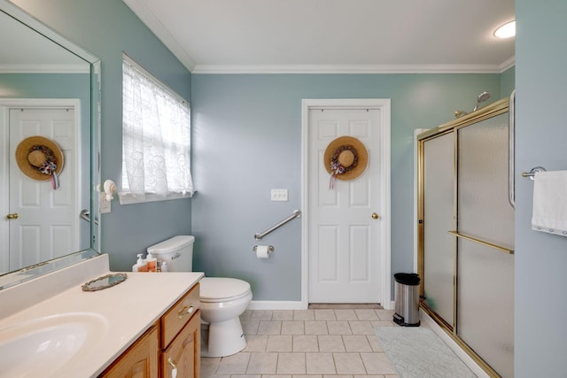 bathroom featuring tile patterned flooring, a shower with door, ornamental molding, vanity, and toilet