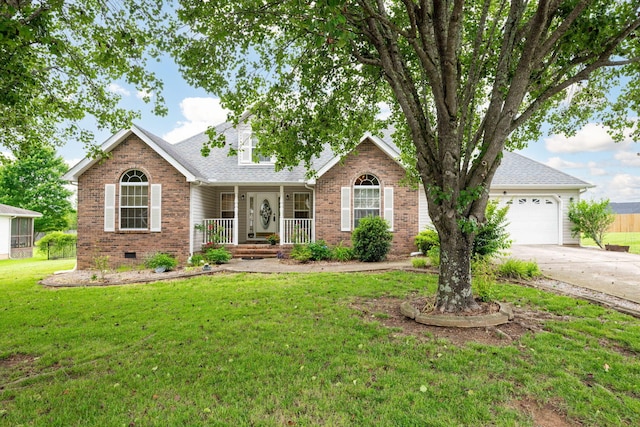 view of front facade featuring a garage, a front lawn, and a porch