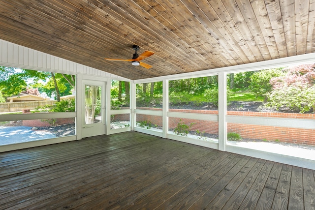 unfurnished sunroom with a wealth of natural light, lofted ceiling, and wood ceiling