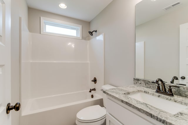 full bathroom featuring vanity,  shower combination, and toilet