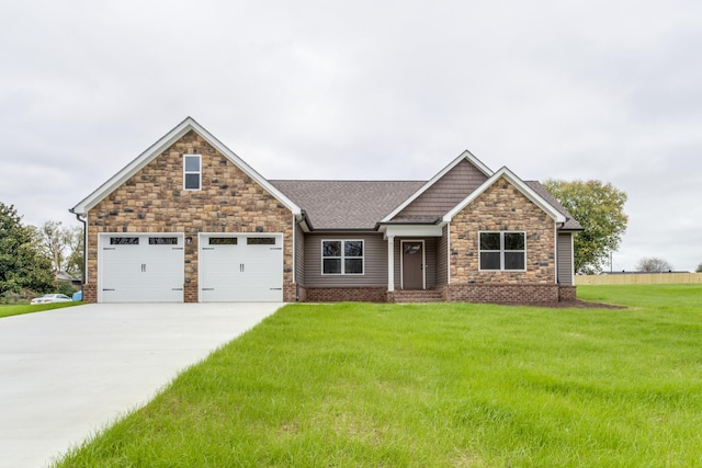 craftsman-style house featuring a front lawn and a garage