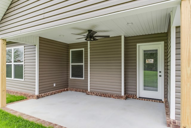 view of patio featuring ceiling fan