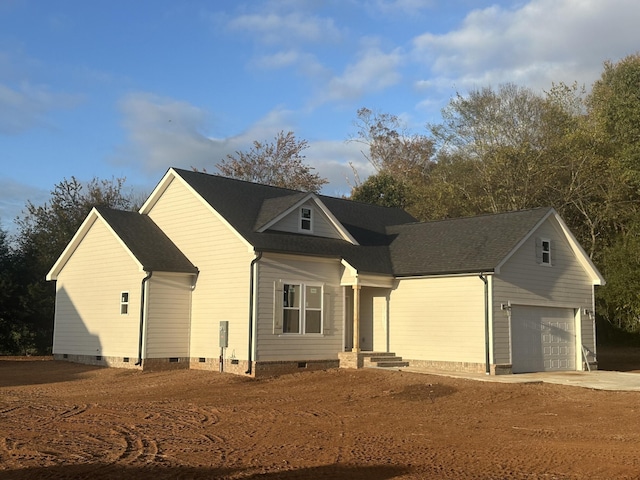 view of front of home with a garage