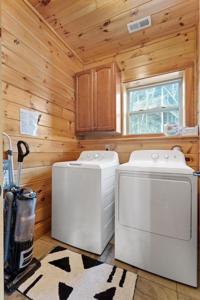 835 Rushing Water Trl, Rising Fawn, GA 30738 - washroom featuring separate washer and dryer, cabinet space, wooden walls, and wooden ceiling