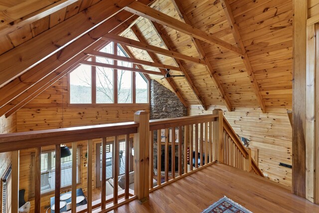 835 Rushing Water Trl, Rising Fawn, GA 30738 - additional living space with wooden ceiling, wood walls, beam ceiling, and wood finished floors