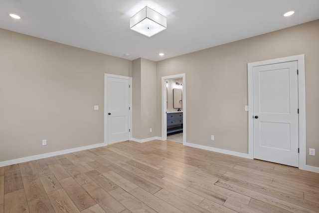 unfurnished room featuring light hardwood / wood-style floors