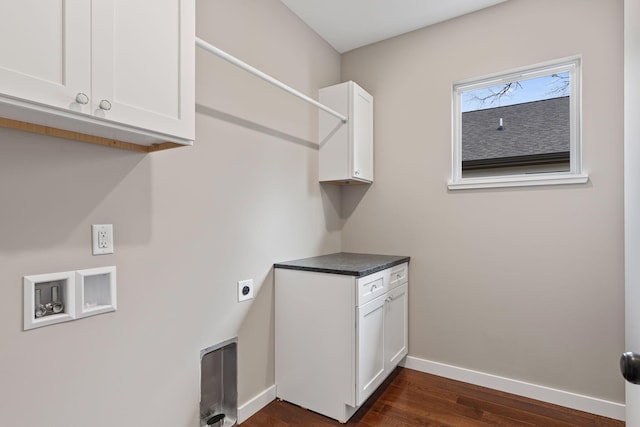 washroom with electric dryer hookup, dark hardwood / wood-style floors, cabinets, and washer hookup