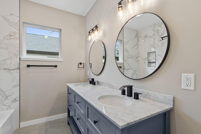 bathroom featuring bathtub / shower combination and vanity