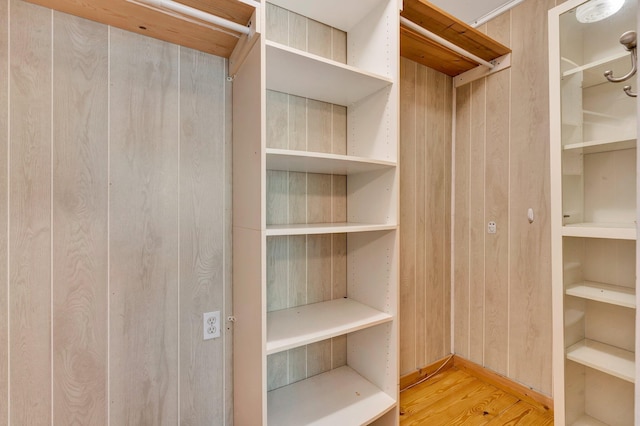 walk in closet featuring light wood-type flooring