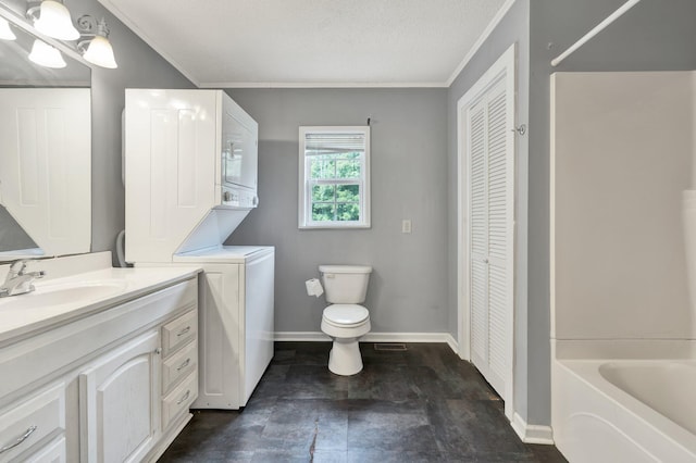 bathroom with vanity, stacked washer / drying machine, crown molding, a textured ceiling, and toilet