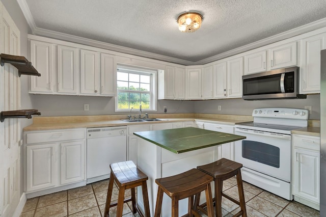 kitchen featuring sink, white appliances, a textured ceiling, white cabinetry, and crown molding