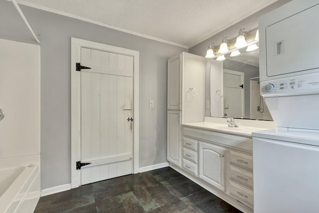 bathroom featuring vanity, plus walk in shower, crown molding, and a textured ceiling