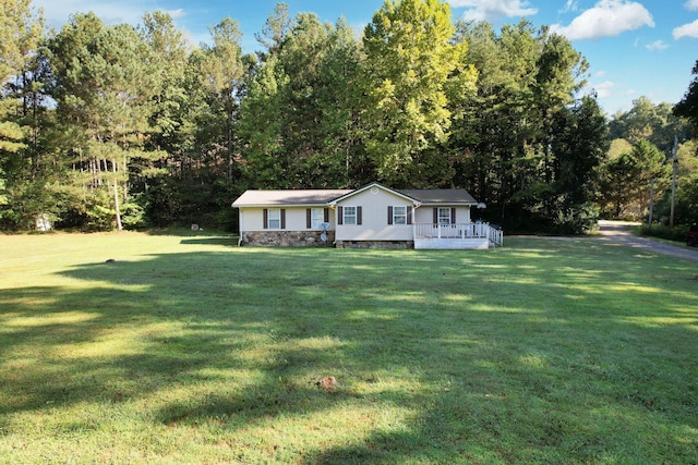 single story home with a front yard