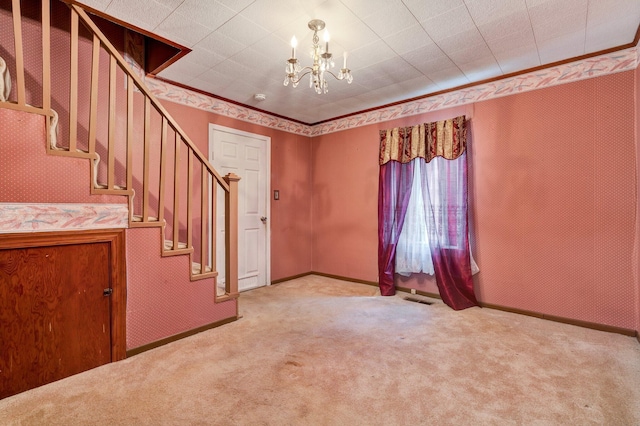 interior space with carpet flooring and a notable chandelier