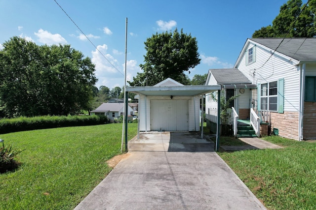 view of front of home featuring a storage unit and a front yard