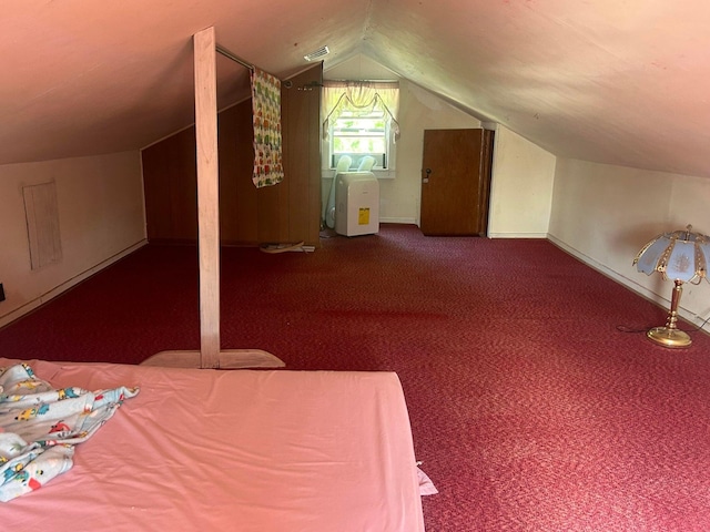 bonus room featuring carpet floors and lofted ceiling