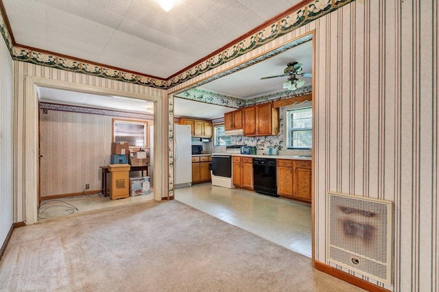 kitchen featuring ceiling fan, heating unit, crown molding, and white appliances