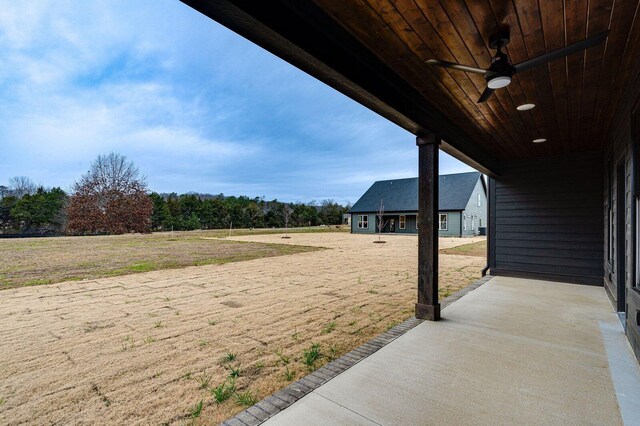 view of yard featuring ceiling fan