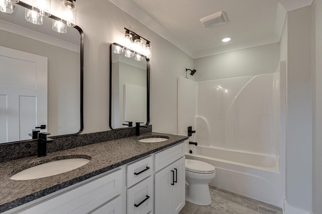 full bathroom featuring toilet, vanity, shower / bath combination, and crown molding