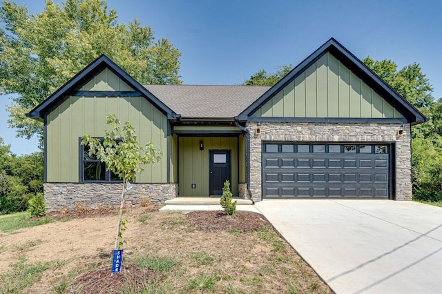 modern inspired farmhouse with a garage