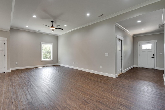 interior space with ornamental molding, ceiling fan, and dark wood-type flooring