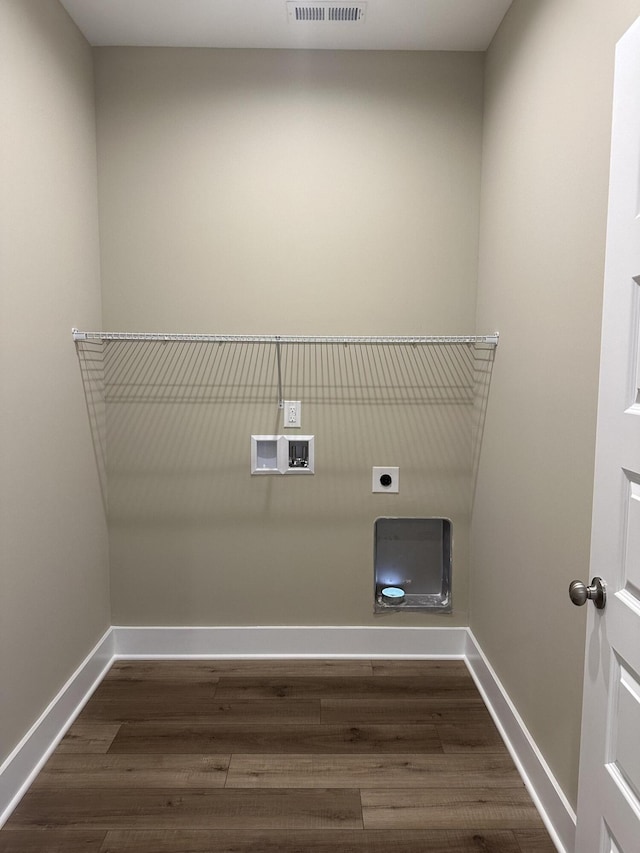 laundry room featuring dark wood-type flooring, electric dryer hookup, and hookup for a washing machine