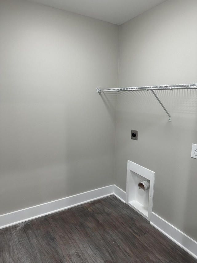 clothes washing area with electric dryer hookup and dark hardwood / wood-style flooring