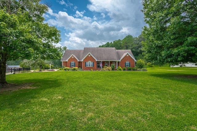 view of front of home with a front yard