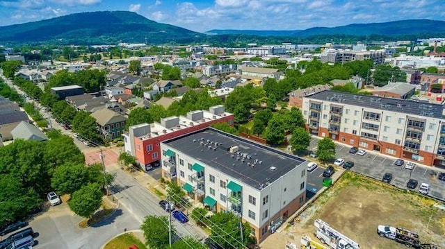 drone / aerial view featuring a mountain view