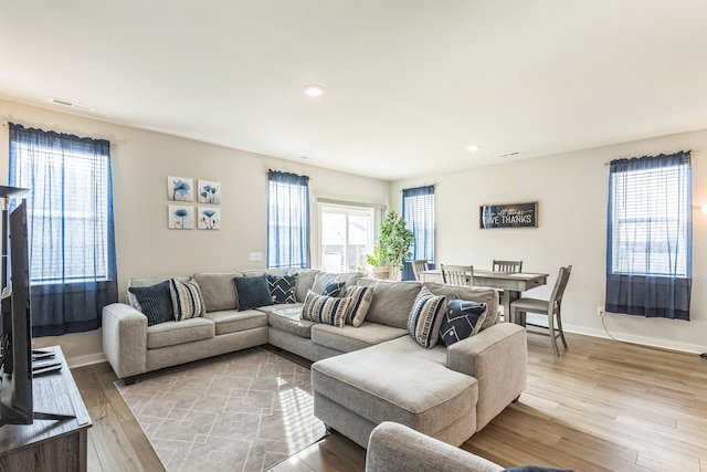 living room featuring light wood-type flooring