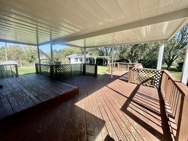 deck featuring a shed