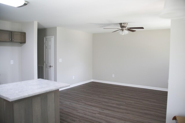 1603 Mantlo St, Springfield, TN 37172 - kitchen featuring a ceiling fan, baseboards, dark wood-style floors, and light countertops