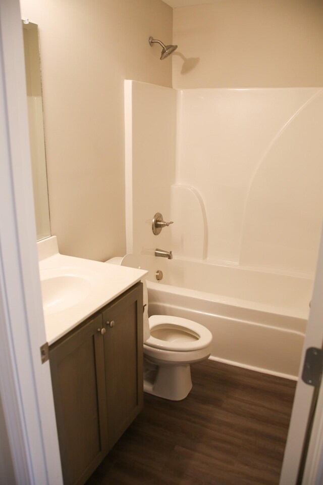 1603 Mantlo St, Springfield, TN 37172 - bathroom featuring vanity, toilet, bathtub / shower combination, and wood finished floors