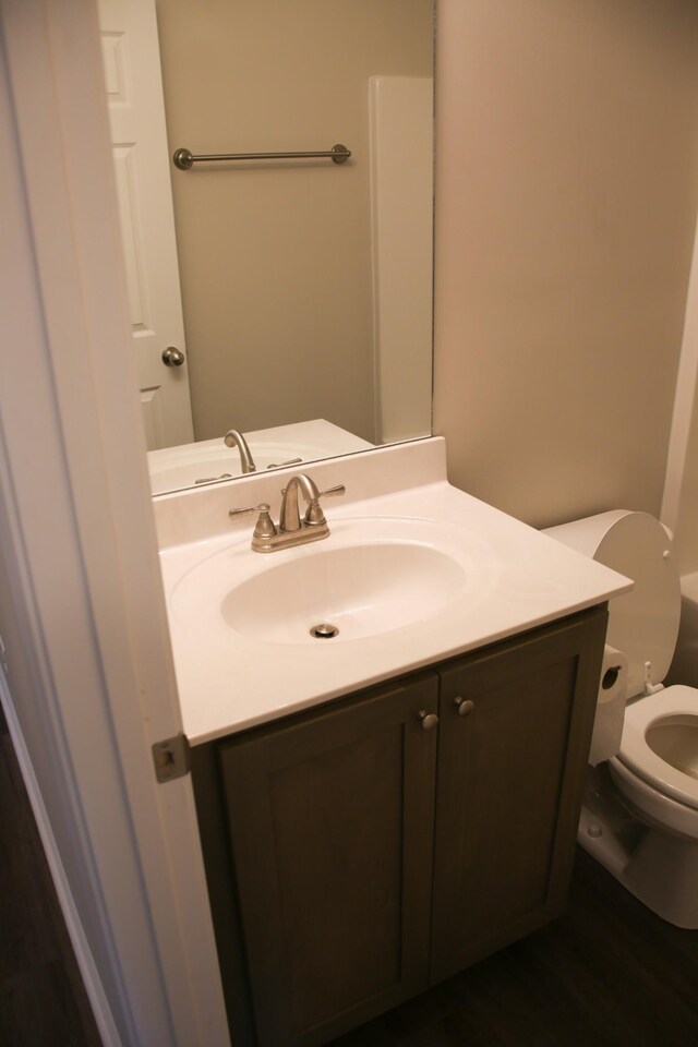 1603 Mantlo St, Springfield, TN 37172 - bathroom with vanity, toilet, and wood finished floors