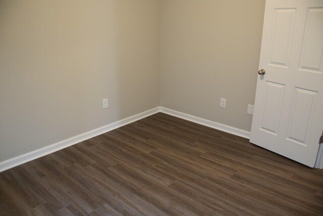 1603 Mantlo St, Springfield, TN 37172 - unfurnished room with baseboards and dark wood-style flooring