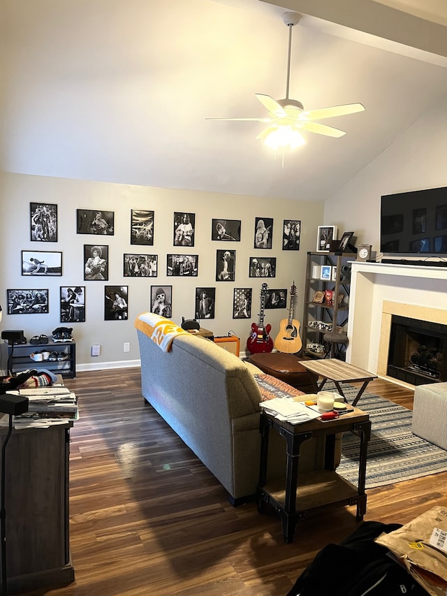 living room featuring beam ceiling, dark wood-type flooring, ceiling fan, and high vaulted ceiling