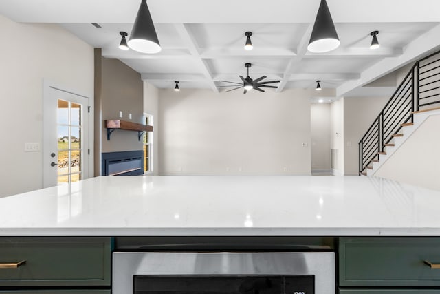 kitchen featuring ceiling fan, beverage cooler, coffered ceiling, beamed ceiling, and green cabinetry