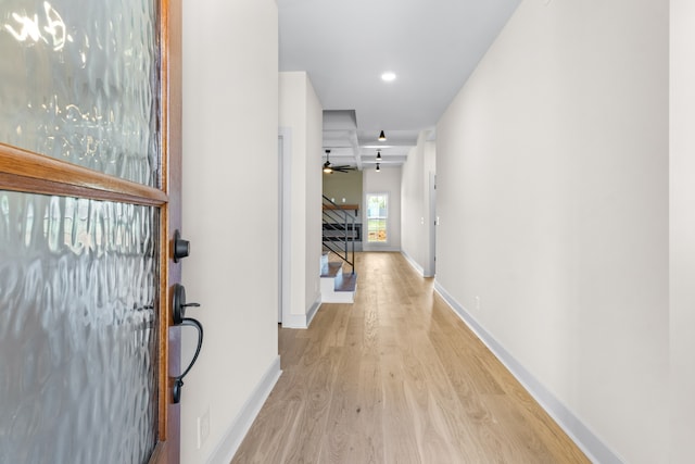 hall with light wood-type flooring