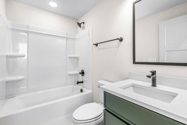 full bathroom featuring vanity, shower / bathtub combination, and toilet