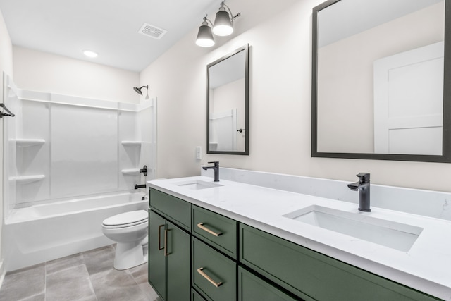 full bathroom featuring vanity, shower / bath combination, and toilet