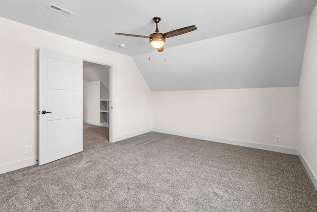 bonus room with carpet, vaulted ceiling, and ceiling fan