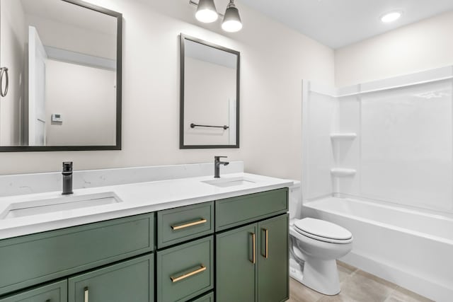 full bathroom with tile patterned floors, vanity,  shower combination, and toilet