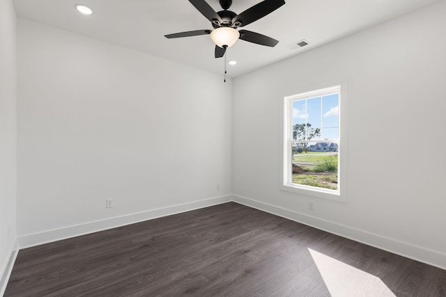 unfurnished room featuring dark hardwood / wood-style flooring and ceiling fan