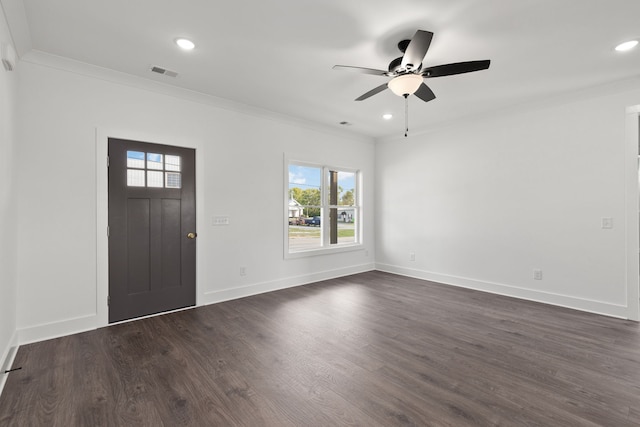 entryway featuring ceiling fan, ornamental molding, and dark wood-type flooring