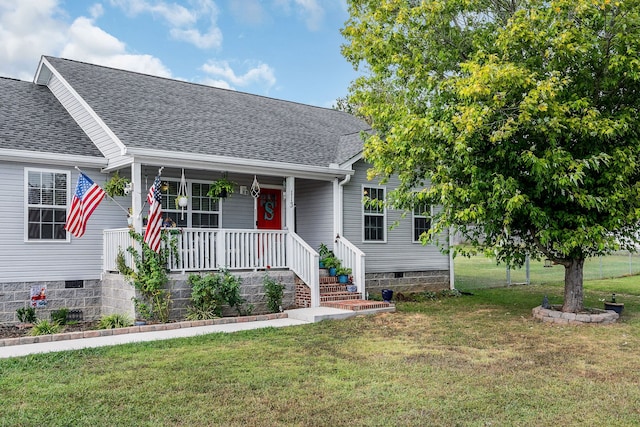 view of front of property with covered porch and a front yard