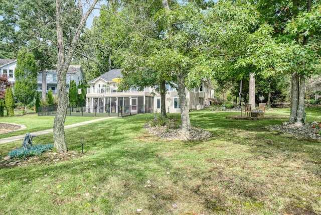 view of yard with a sunroom