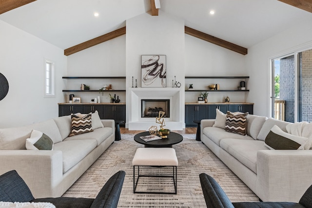 living room with high vaulted ceiling, light wood-type flooring, and beamed ceiling