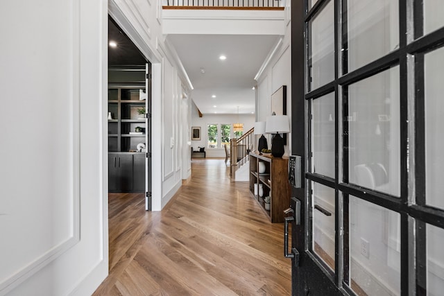 foyer with light wood-type flooring